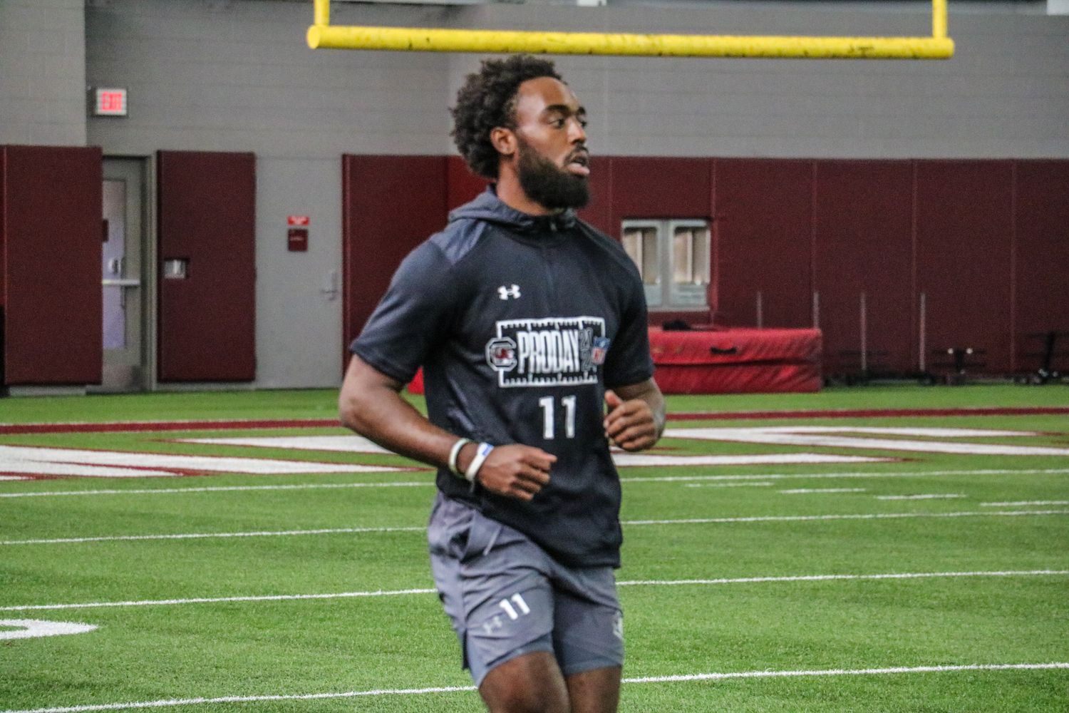 Eddie Lewis getting warmed up for the 40-yard dash.